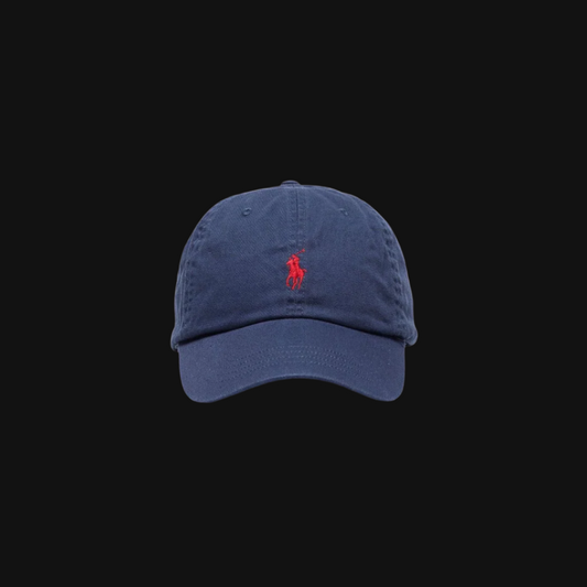 Navy blue cap with a red logo on a black background